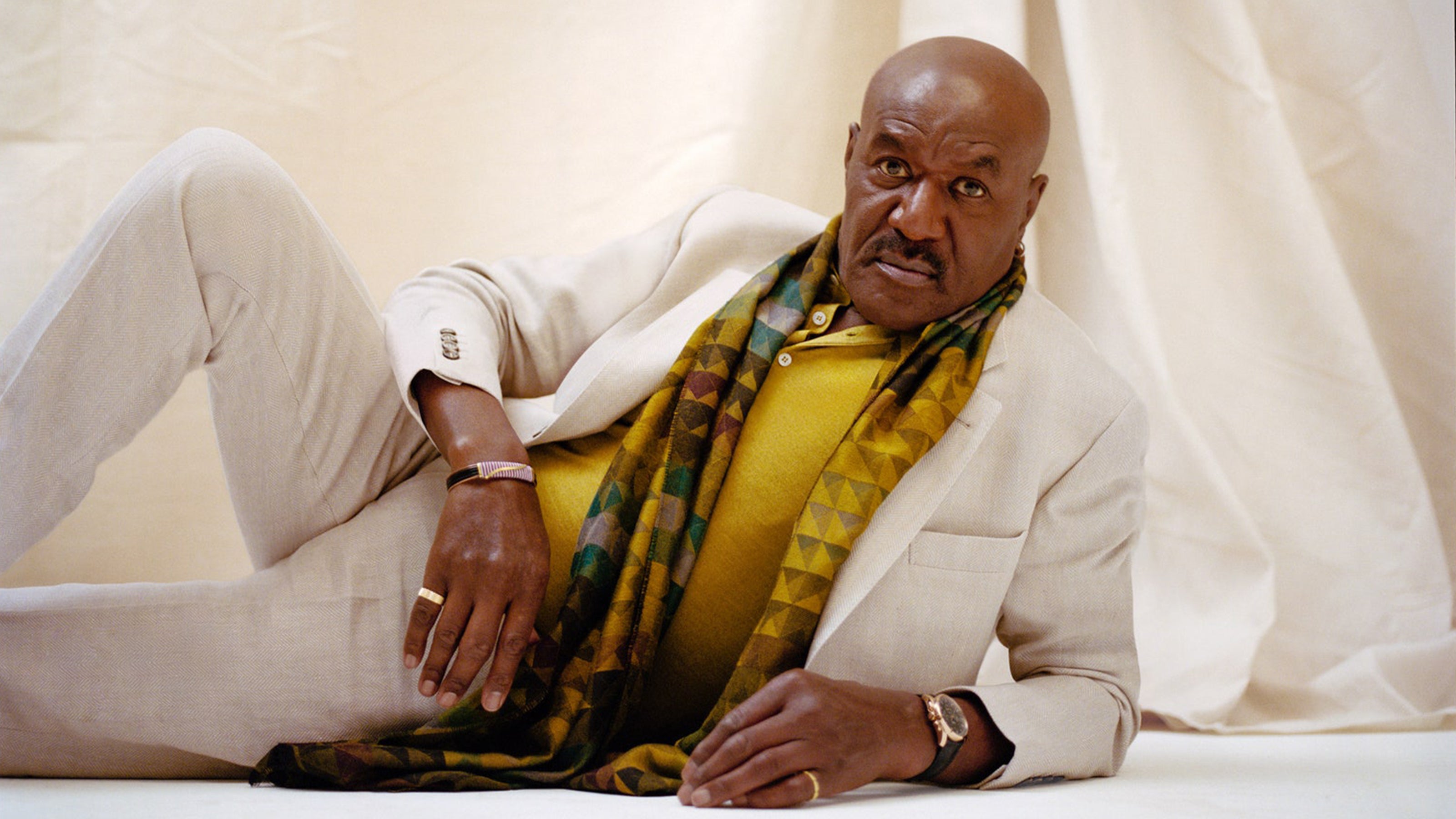 Delroy-Lindo-Fabergé-Visionnaire-DTZ-Gallivanter-Watch-Colours-of-Love-Yellow-Gold-Fluted-Healing-Ring-May-issue-of-GQ