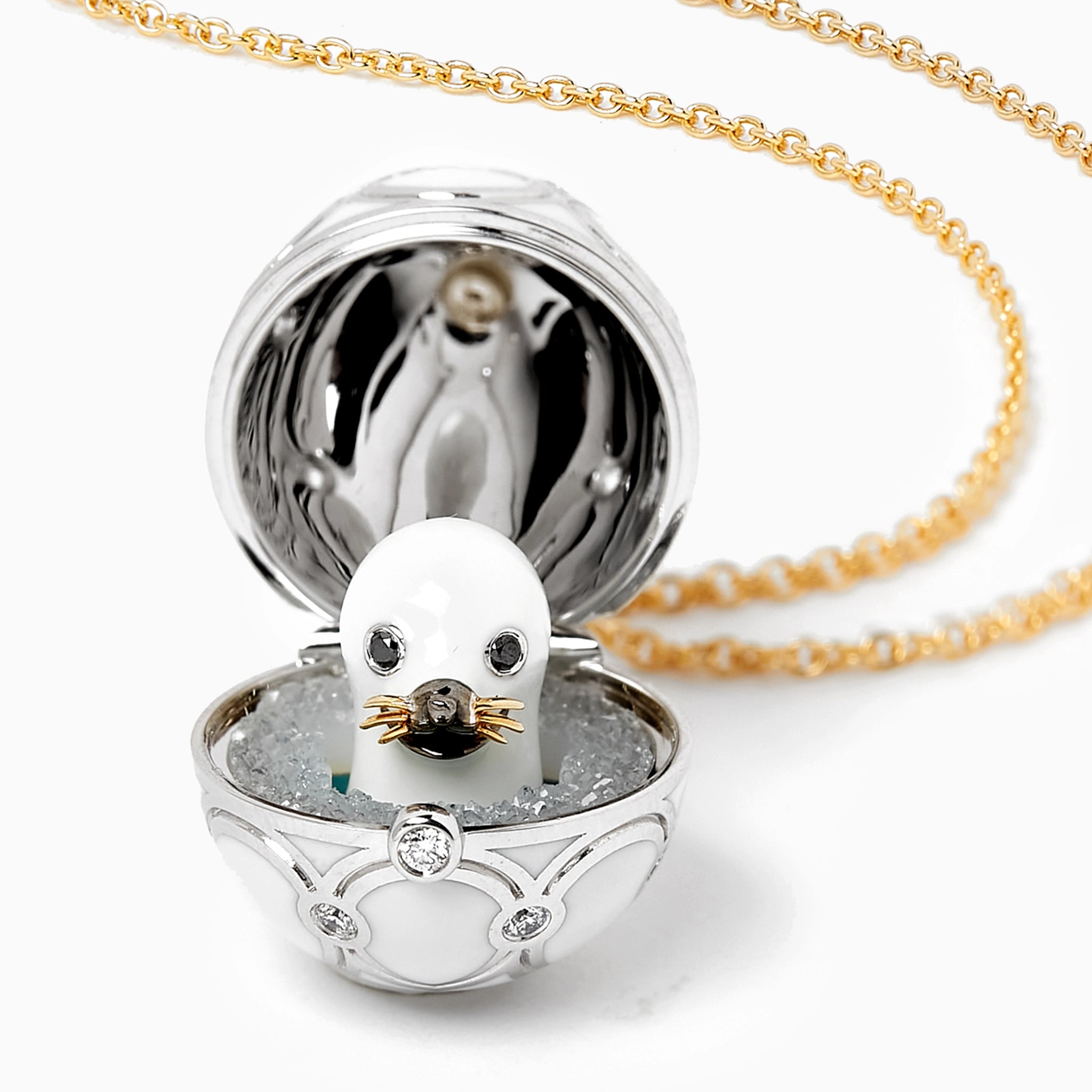 Yellow and White Gold Diamond and Black Enamel Seal Pup Surprise Locket | Fabergé