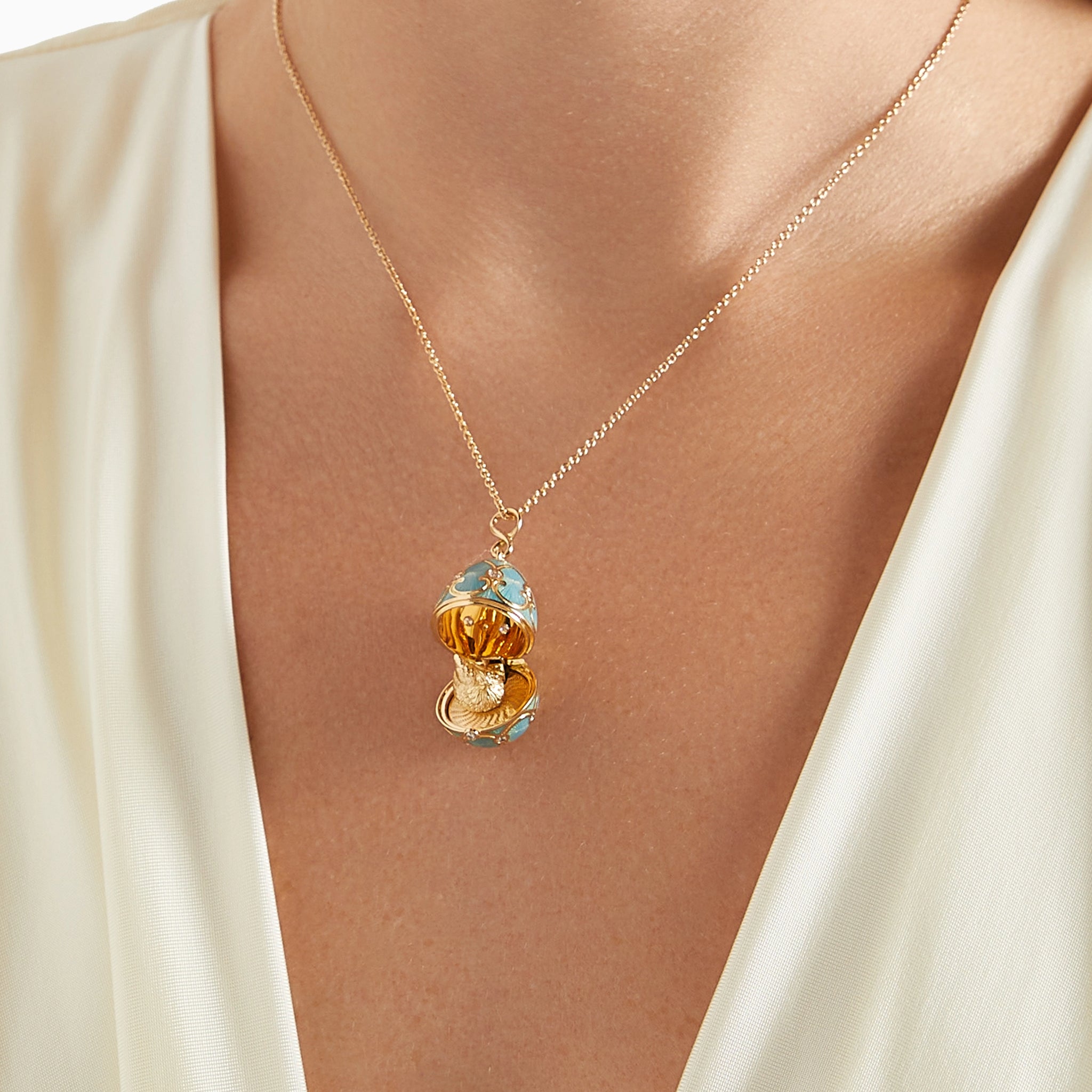 Yellow Gold Diamond & Turquoise Guilloché Enamel Hen Surprise Locket | Fabergé