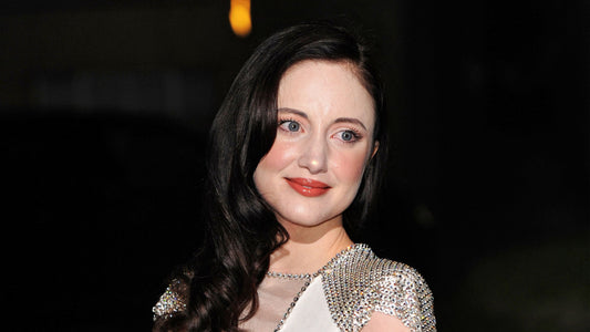 Andrea-Riseborough-Fabergé-Solyanka-Cabochon-Emerald-ring-set-2013-London-Evening-Standard-British-Film-Awards