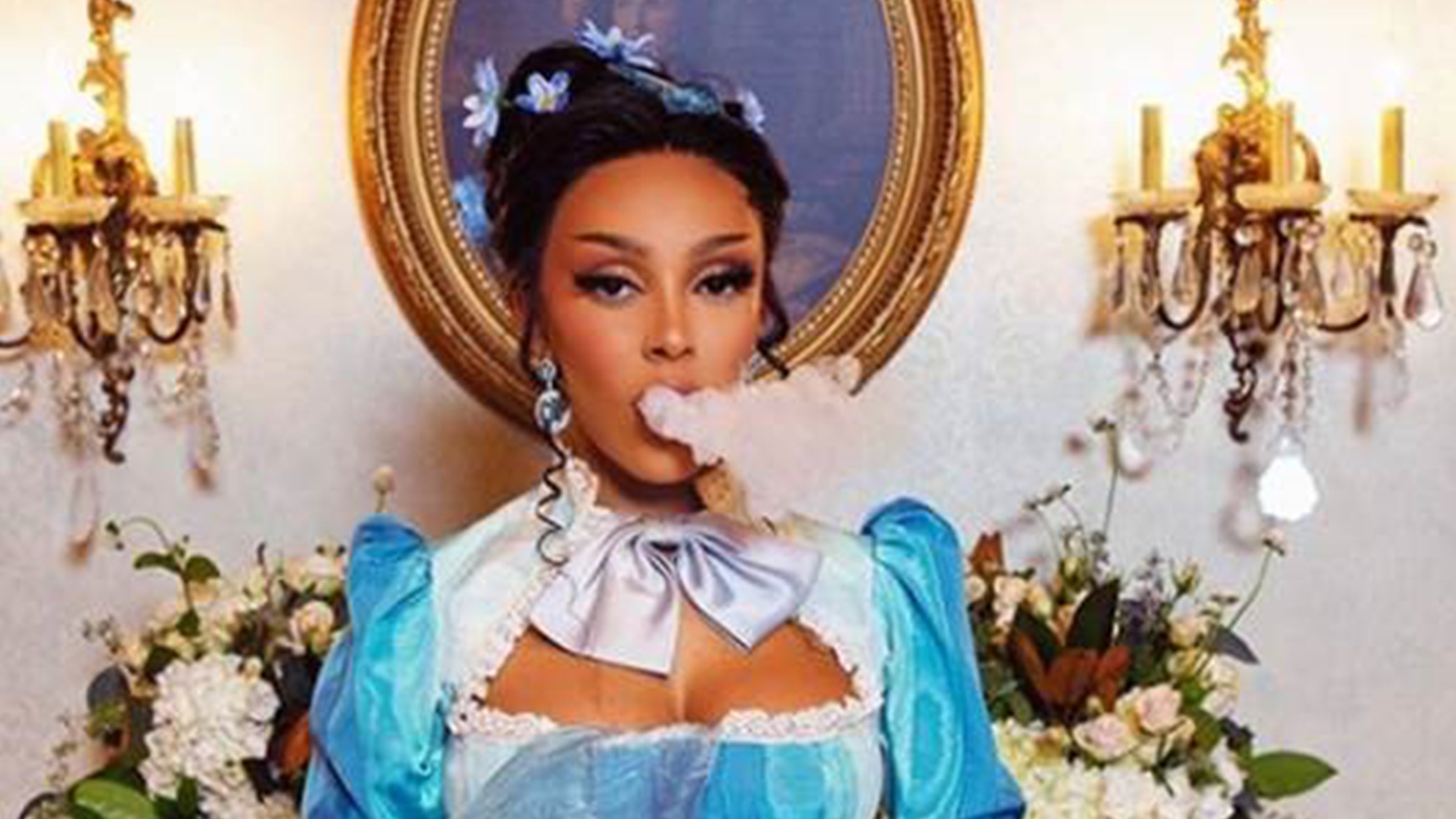 Doja-Cat-Wears-Faberge-Katharina-Aquamarine-Ring-and-Devotion-Aquamarine-Ring-in-music-video-Baby-I’m-Jealous