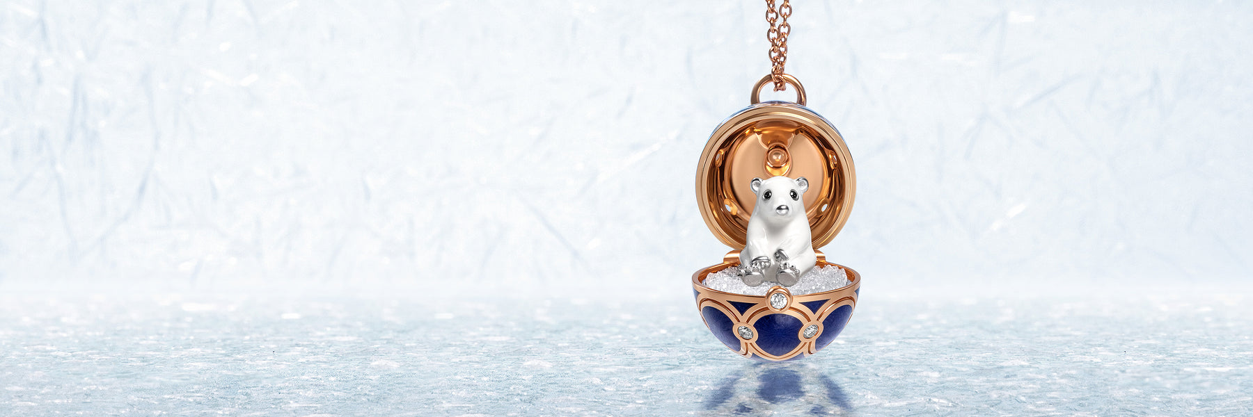 Fabergé pendant with a small panda figurine on a light blue background